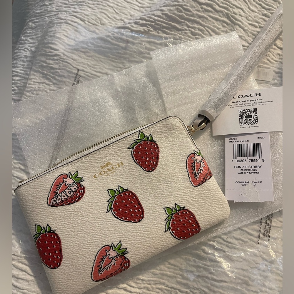 Coach leather corner zip wristlet with strawberry print. NWT!